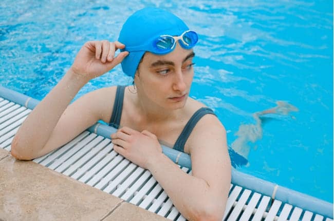 Wearing a swim cap can protect your hair