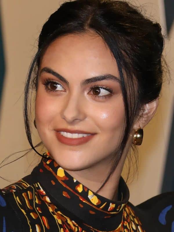 Camila Mendes in French roll hairstyle