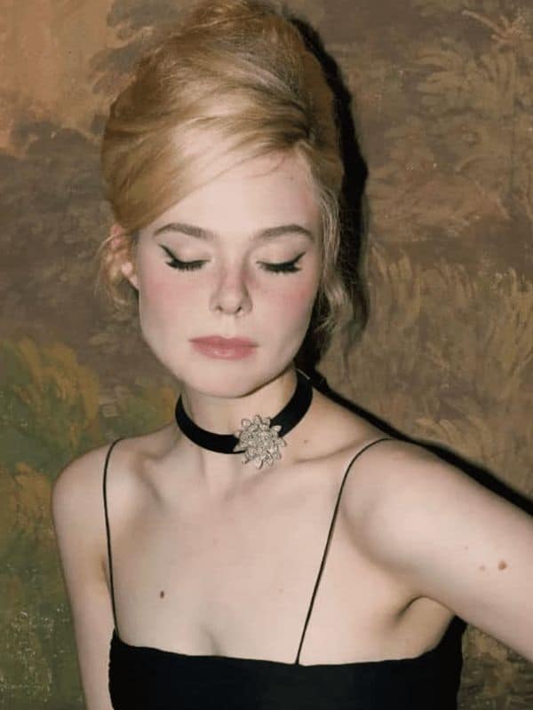 Elle Fanning in French roll hairstyle