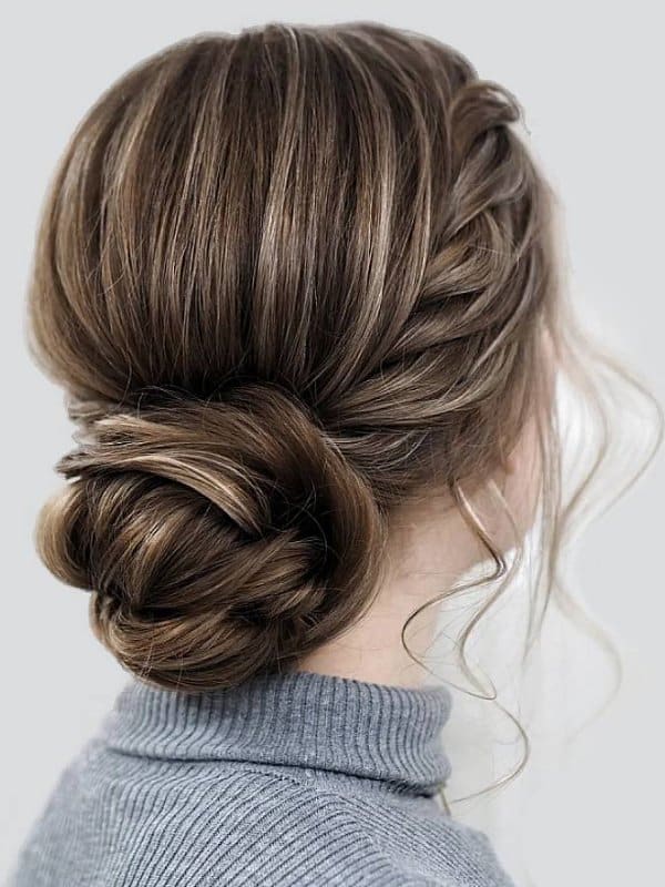 A chic twisted bun brings us a soft vibe