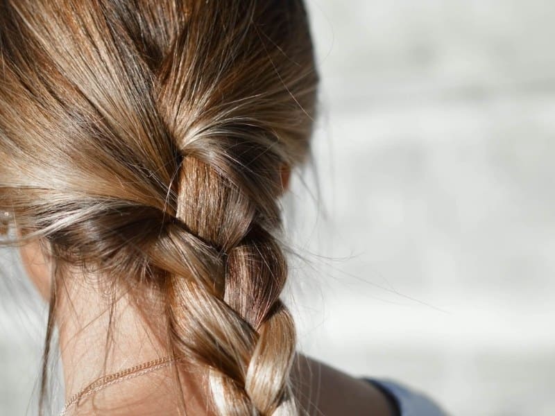 Braid your hair before you sleep with tape-in hair extensions 