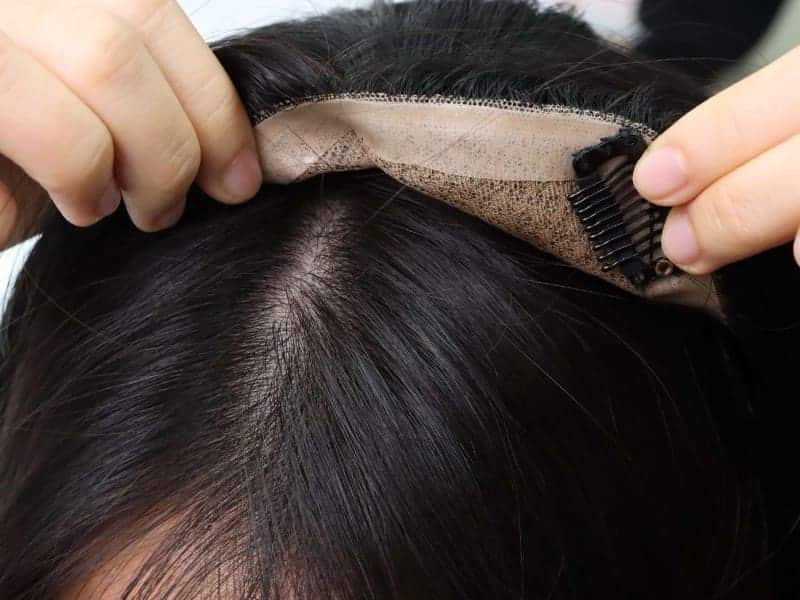 Clip-in hair toppers are temporary, but convenient to wear and remove any time