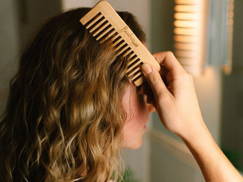 Use a wide-toothed comb to untangle the knots