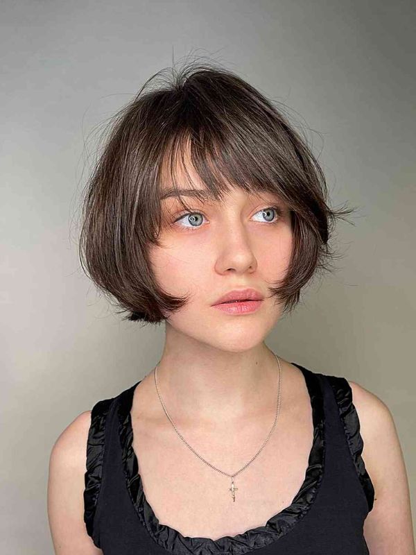 It's a fantastic way to showcase texture and style in an adorable inverted bob