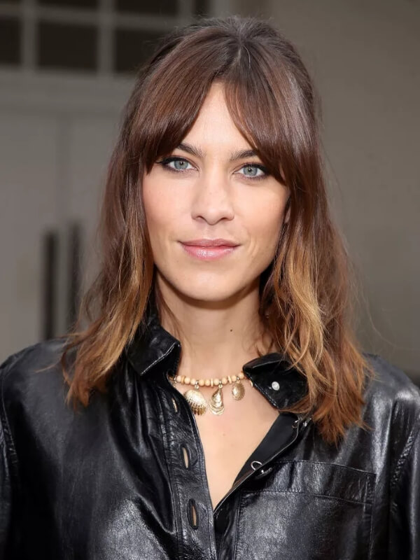 Alexa Chung’s tousled lob creates a chic look that flatters her diamond face shape