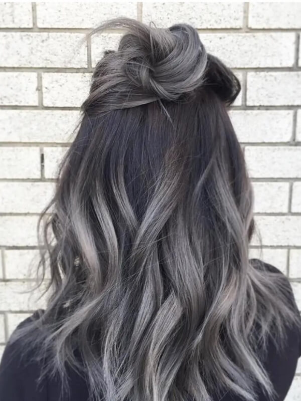 Ashy tones are gaining popularity, and an ombre style is the perfect way to try this smoky trend