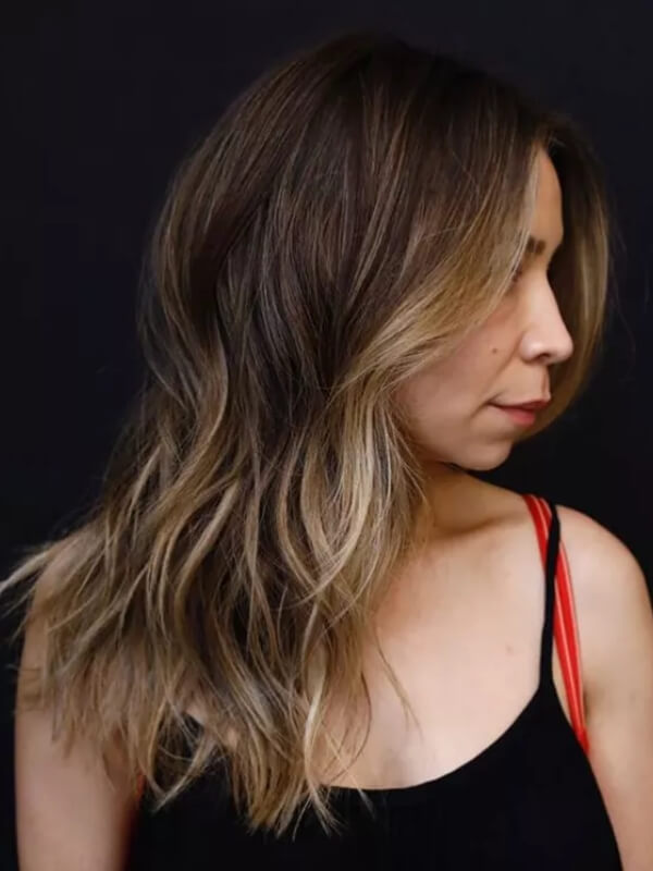 For a sun-kissed glow, honey balayage is the perfect choice