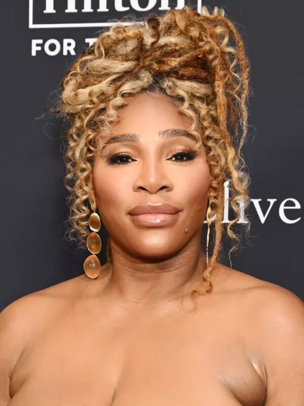 Serena Williams rocks a textured updo that complements her diamond face shape perfectly