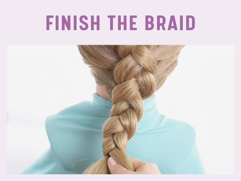 Softly pull at the outer edges of the braid to create a looser appearance