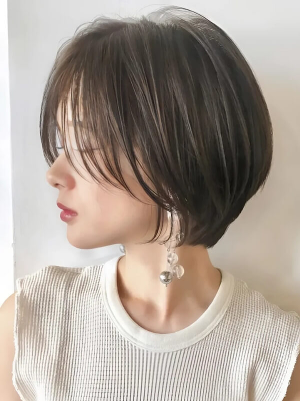 The layered bob adds depth and volume by incorporating layers