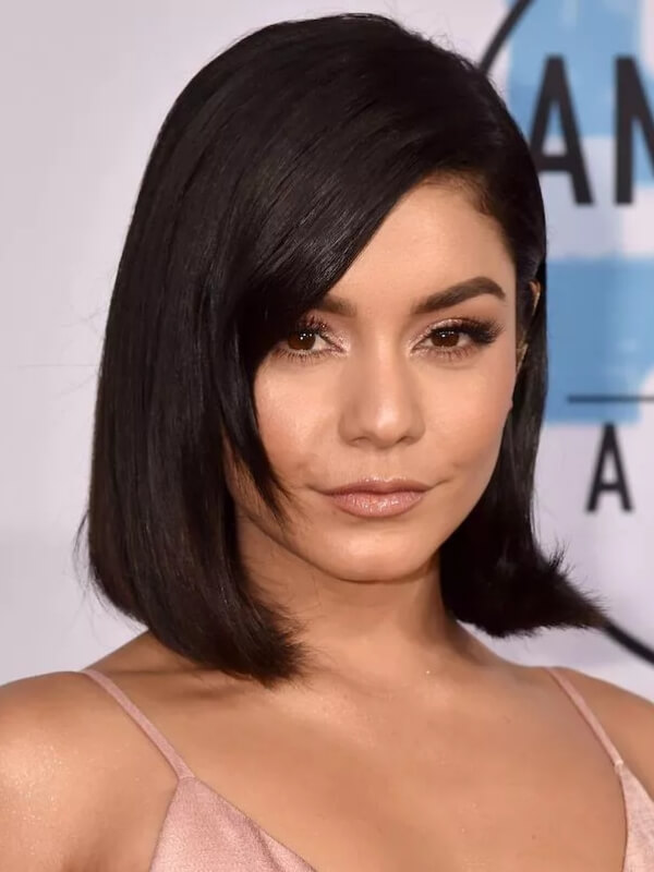 Vanessa Hudgens shows how face-framing bangs can create an open and flattering look